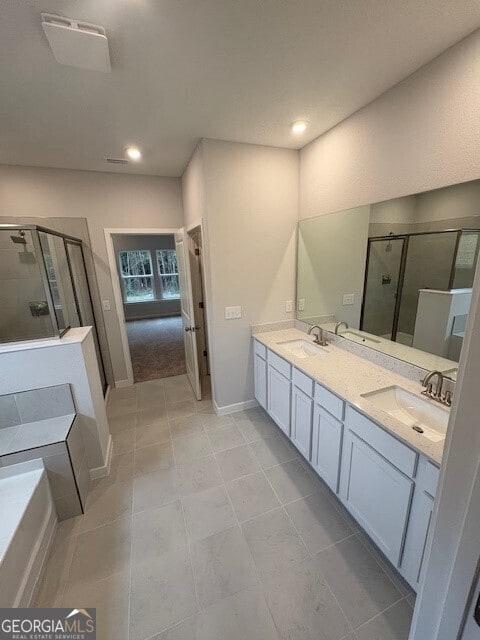 203 Park View Ln, Kingsland, GA 31548 - full bath featuring a shower stall, double vanity, recessed lighting, baseboards, and tile patterned floors