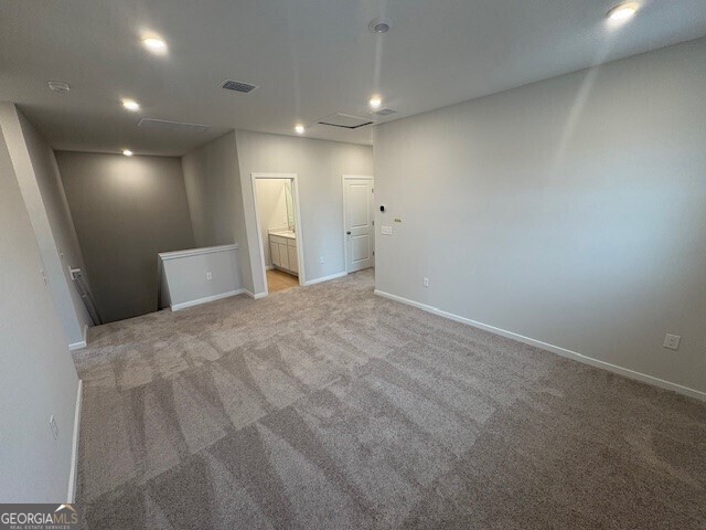 203 Park View Ln, Kingsland, GA 31548 - spare room with light colored carpet, baseboards, and recessed lighting