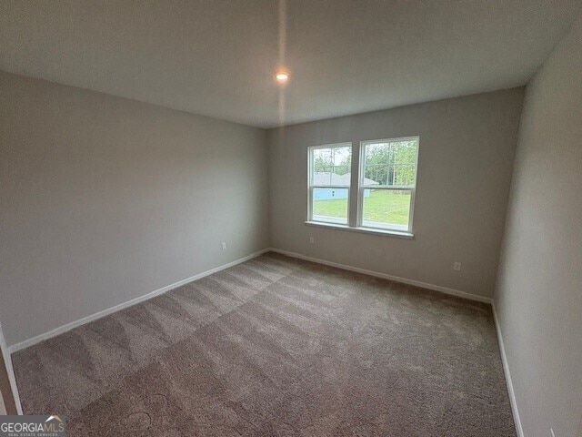 203 Park View Ln, Kingsland, GA 31548 - carpeted spare room with baseboards