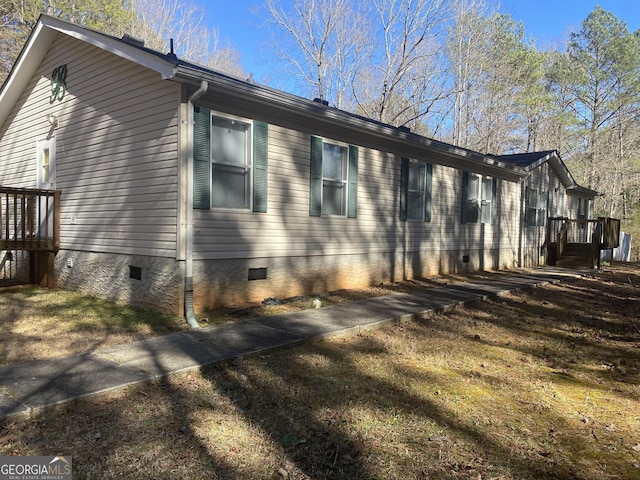 view of property exterior featuring crawl space