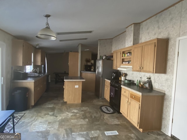 kitchen with electric range, a sink, freestanding refrigerator, a center island, and open shelves