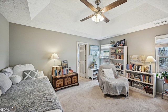 bedroom featuring multiple windows, carpet, and visible vents