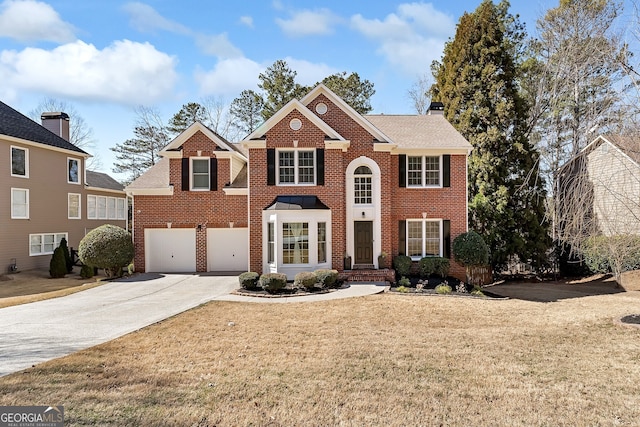 view of front facade featuring driveway, brick siding, a front lawn, and a chimney