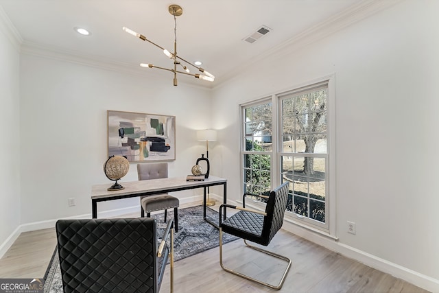 office area featuring light wood-type flooring, baseboards, visible vents, and crown molding