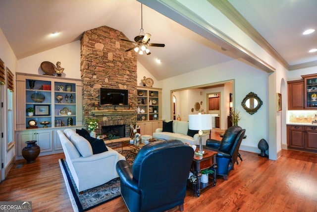 living area featuring ornamental molding, wood finished floors, a fireplace, high vaulted ceiling, and recessed lighting