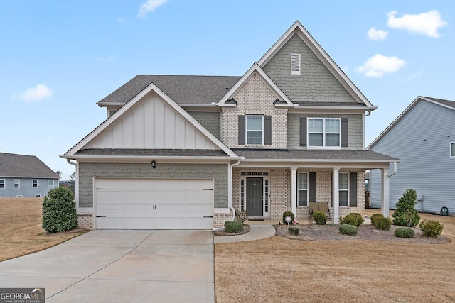 craftsman inspired home featuring a porch, a shingled roof, concrete driveway, an attached garage, and board and batten siding