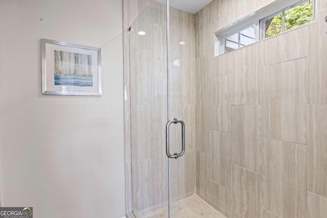 full bath featuring a stall shower