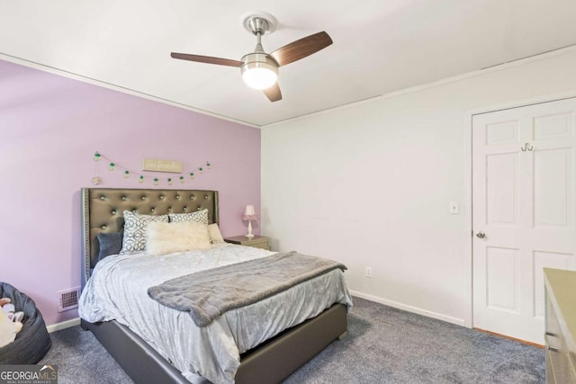 bedroom with ceiling fan, carpet floors, visible vents, and baseboards