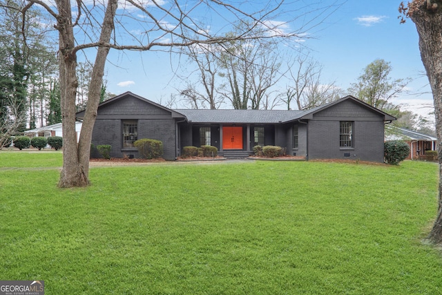 view of front of property featuring crawl space, a front lawn, and brick siding