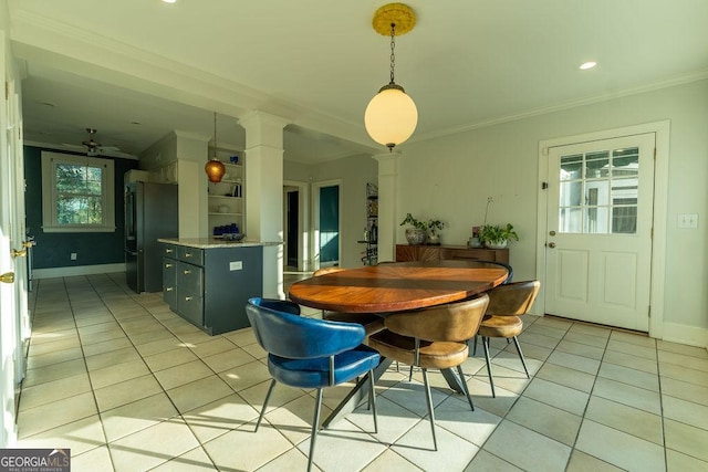 dining area with light tile patterned floors, recessed lighting, baseboards, ornamental molding, and decorative columns