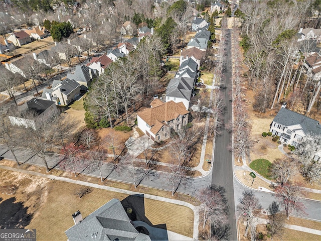 birds eye view of property with a residential view