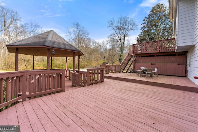 wooden terrace with a gazebo