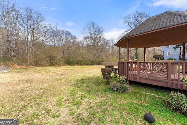 view of yard featuring a deck