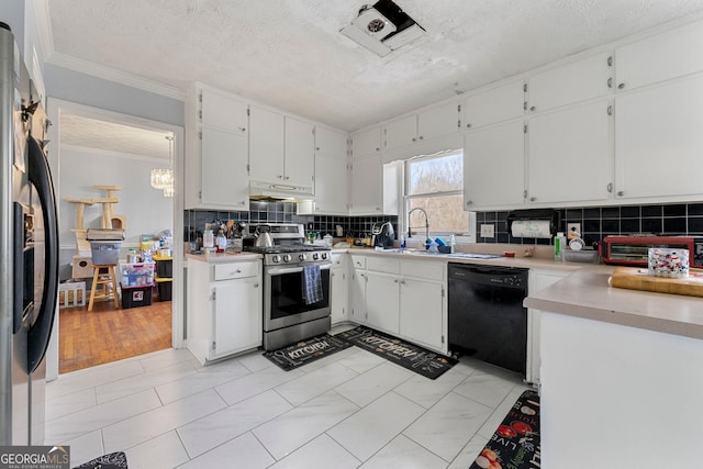 kitchen with crown molding, stainless steel appliances, backsplash, a sink, and under cabinet range hood