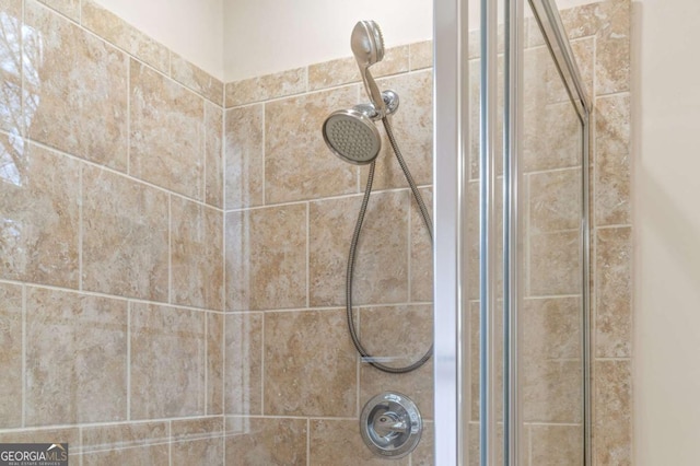 details featuring a tile shower