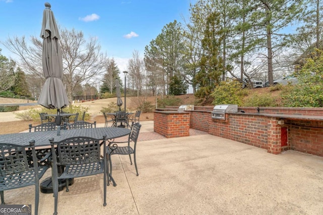 view of patio featuring outdoor dining area and area for grilling