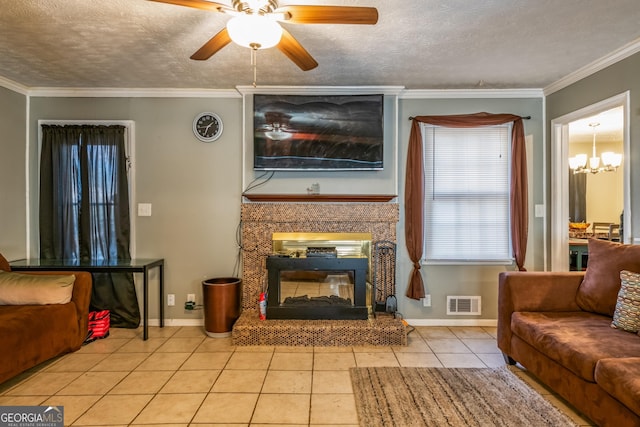 tiled living room with ornamental molding, visible vents, a textured ceiling, and baseboards