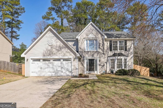 view of front of property featuring a garage, fence, concrete driveway, and a front yard