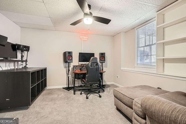 office with ceiling fan, carpet floors, a drop ceiling, and baseboards