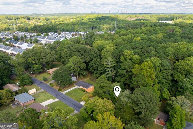 aerial view featuring a view of trees