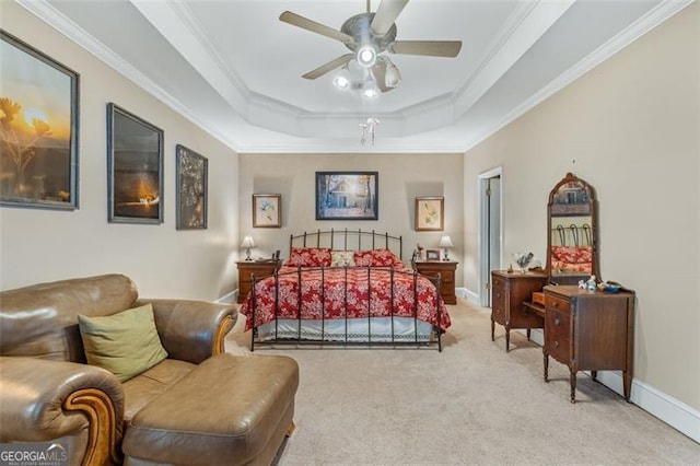 bedroom with crown molding, a raised ceiling, light colored carpet, a ceiling fan, and baseboards