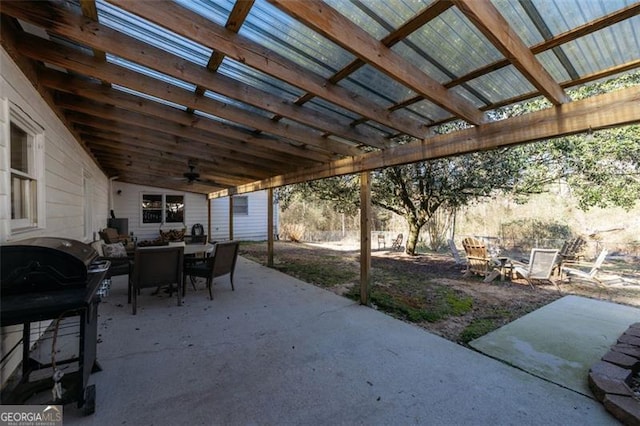 view of patio / terrace featuring ceiling fan, outdoor dining area, a pergola, and area for grilling