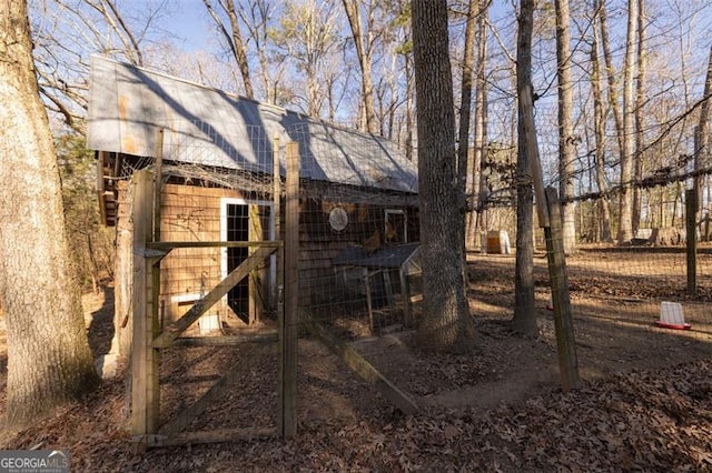 exterior space with an outbuilding and exterior structure