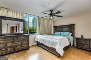 bedroom featuring light wood-style flooring