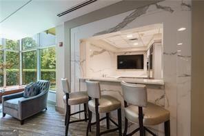 bar featuring wood finished floors