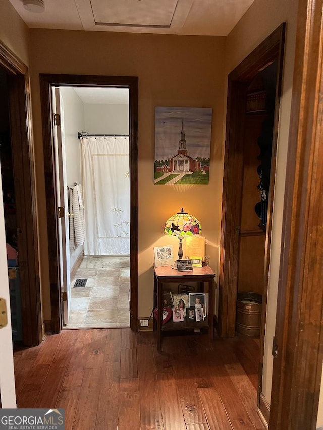 219 Loblolly Dr, Swainsboro, GA 30401 - corridor featuring visible vents and hardwood / wood-style flooring