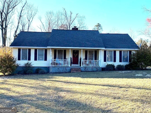 single story home with a shingled roof, covered porch, a chimney, and a front lawn