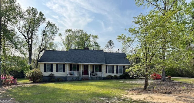 219 Loblolly Dr, Swainsboro, GA 30401 - ranch-style home featuring a front yard, a porch, and a chimney
