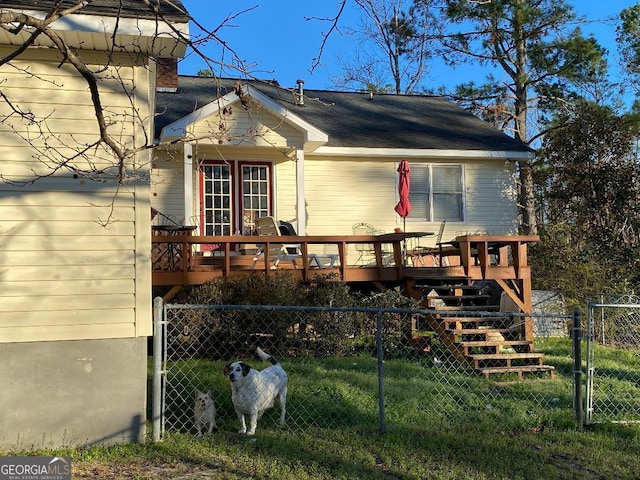 219 Loblolly Dr, Swainsboro, GA 30401 - view of front of house with a gate, a wooden deck, and fence