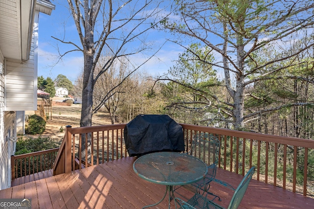 deck featuring outdoor dining area