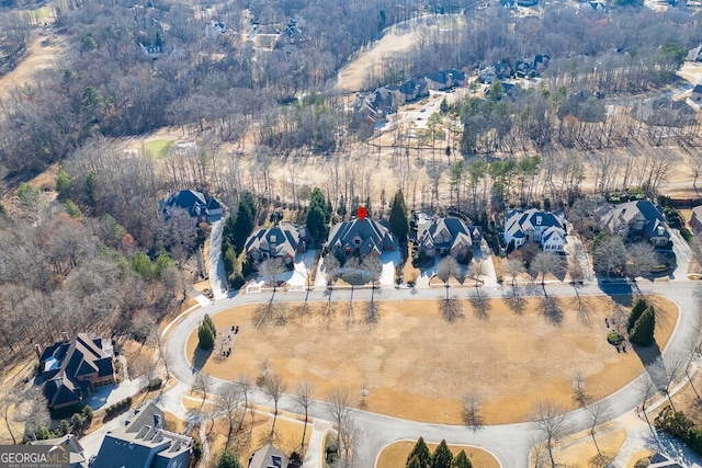 drone / aerial view with a view of trees