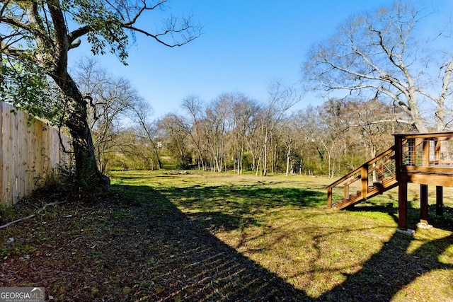 view of yard featuring fence