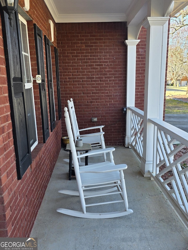 balcony featuring covered porch