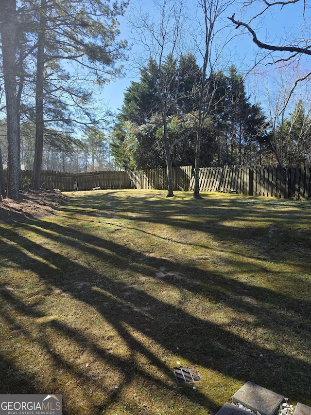 view of yard with fence