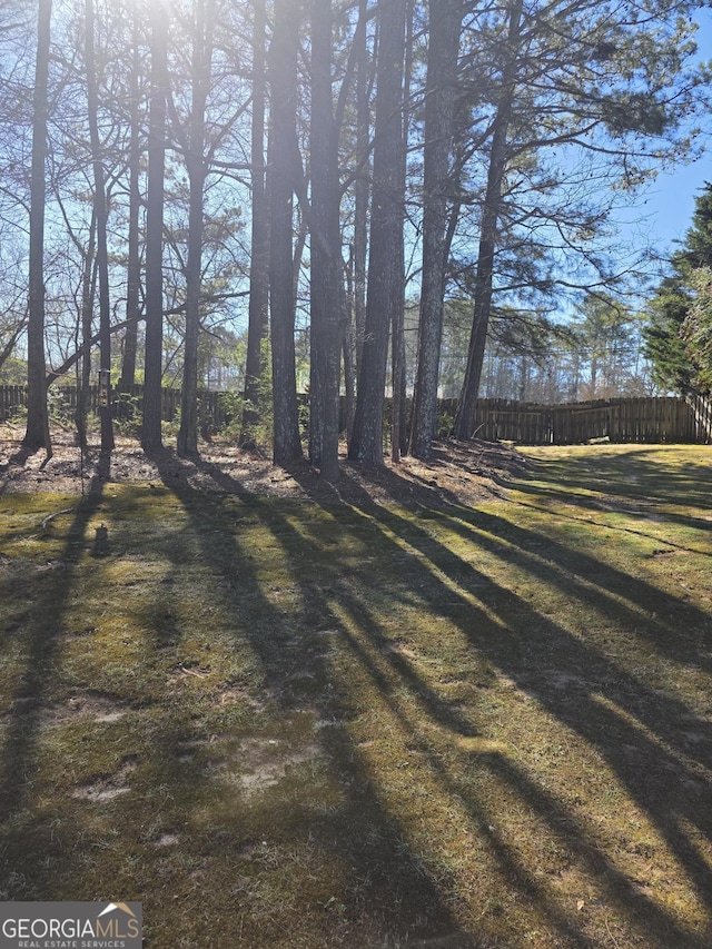 view of yard with fence