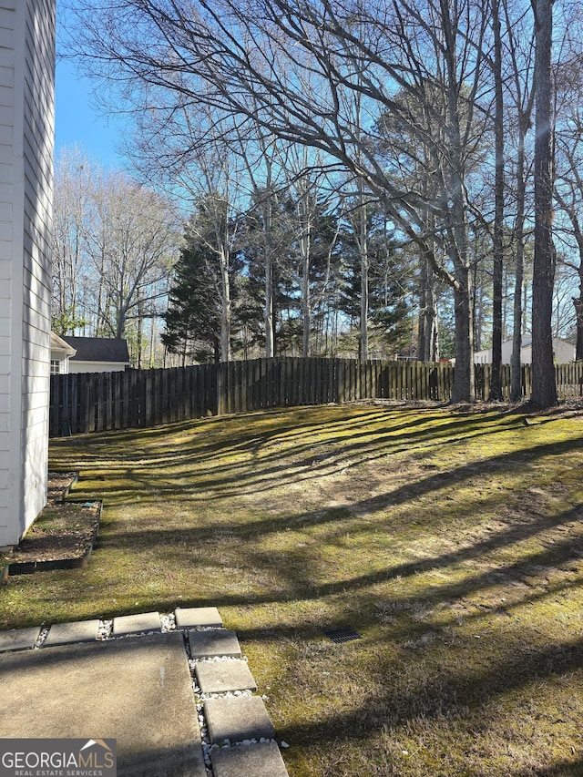 view of yard with fence