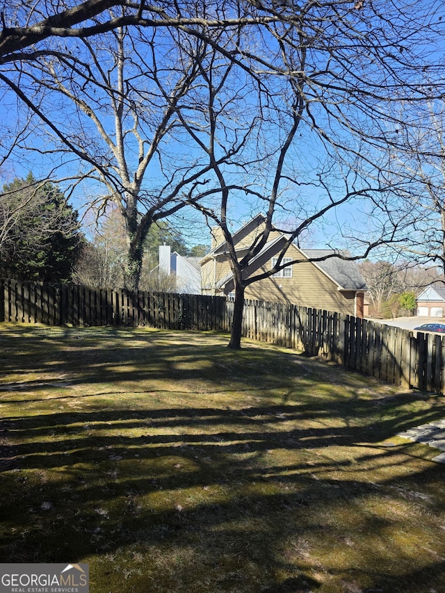 view of yard with fence