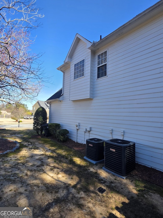 view of property exterior featuring central air condition unit