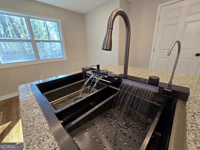 room details with a sink and baseboards