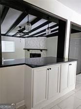 bar featuring beam ceiling and coffered ceiling