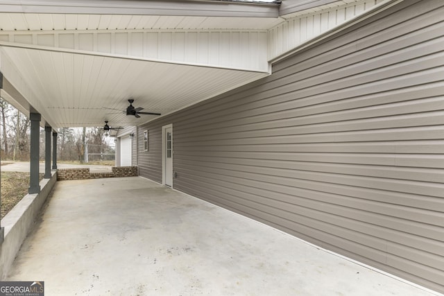 view of patio featuring ceiling fan