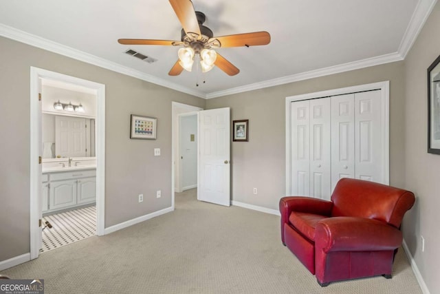 sitting room with baseboards, carpet floors, visible vents, and crown molding