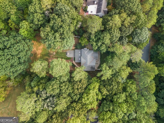 drone / aerial view with a forest view