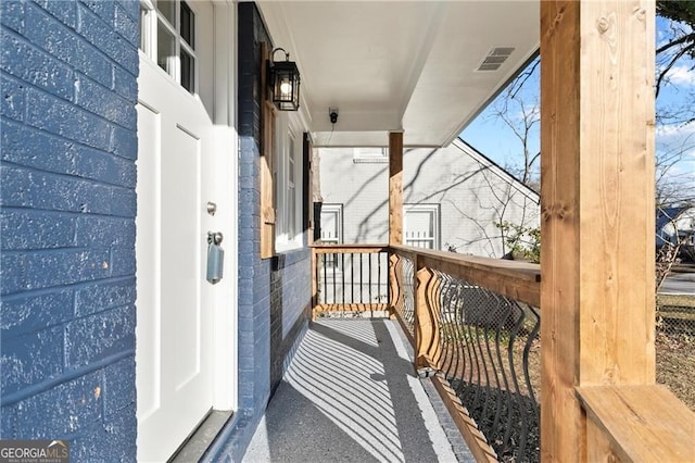 balcony featuring visible vents