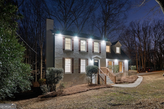 view of front of home featuring brick siding