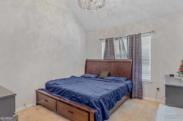 bedroom with lofted ceiling, baseboards, an inviting chandelier, and light colored carpet